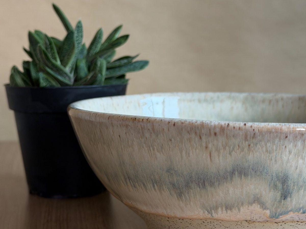 A simple ceramic plate with a clean rim