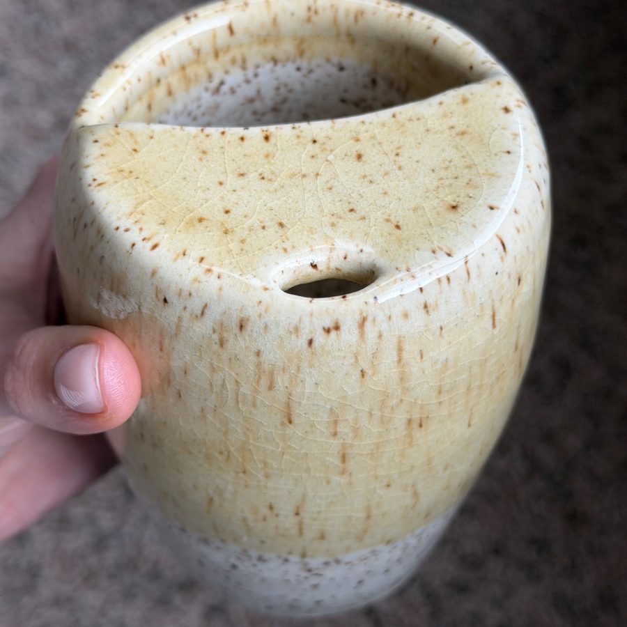 Pottery piece on a table in natural light